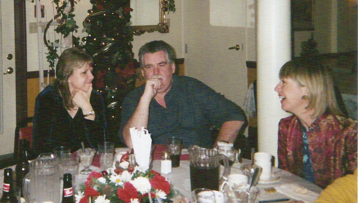 The late Connie Johnson and husband Jeff along with Joan from an office Christmas celebration. She is dearly missed.